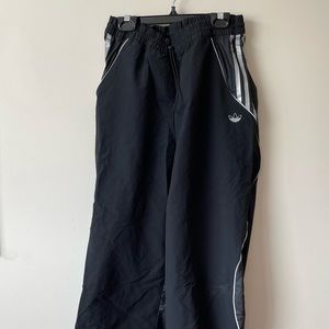 Adidas originals fakten track bottoms in black.